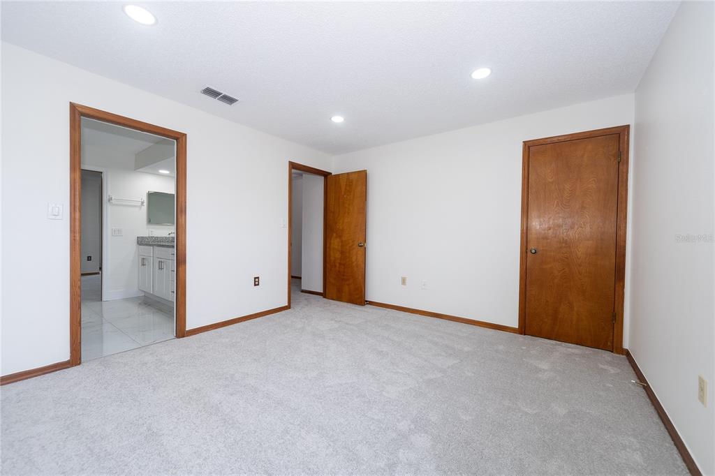 8557 Pilgrim Court New Port Richey, FL 34653 - Photo 20 of 29 a view of an empty room