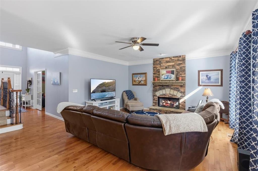 175 Gellmore Lane Acworth, GA 30101 - Photo 11 of 67 a living room with furniture and a flat screen tv