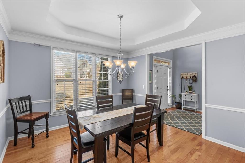 175 Gellmore Lane Acworth, GA 30101 - Photo 23 of 67 a view of a dining room with furniture window and wooden floor