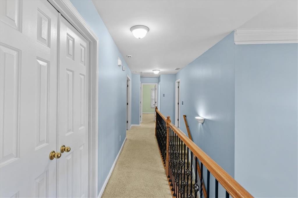 175 Gellmore Lane Acworth, GA 30101 - Photo 24 of 67 a view of a hallway with wooden floor and staircase