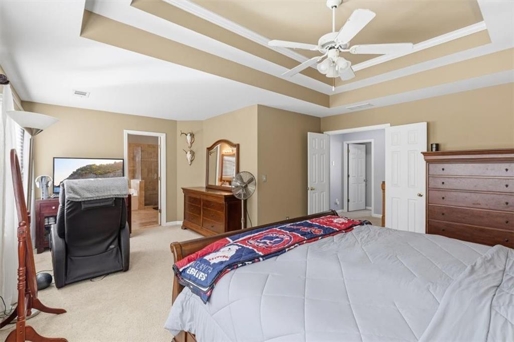 175 Gellmore Lane Acworth, GA 30101 - Photo 26 of 67 a bedroom with a bed and a television