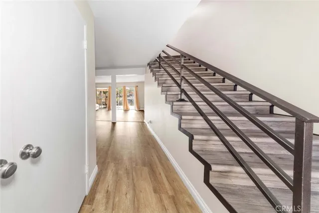 a view of entryway with wooden floor