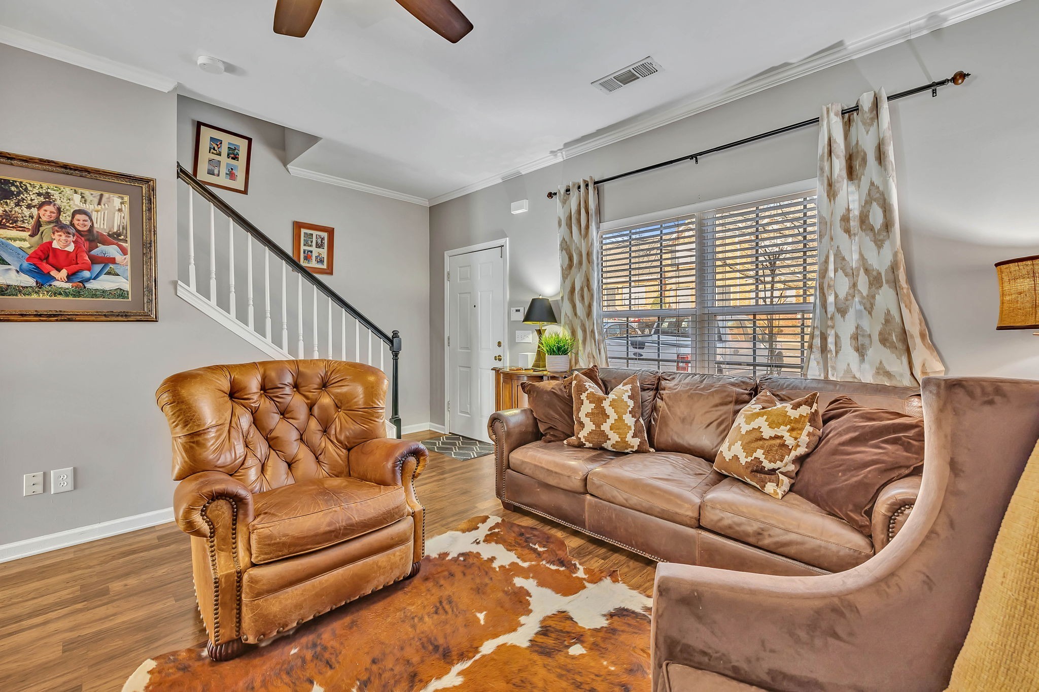 1101 Downs Boulevard, Unit I104 Franklin, TN 37064 - Photo 9 of 22 a living room with furniture and a large window