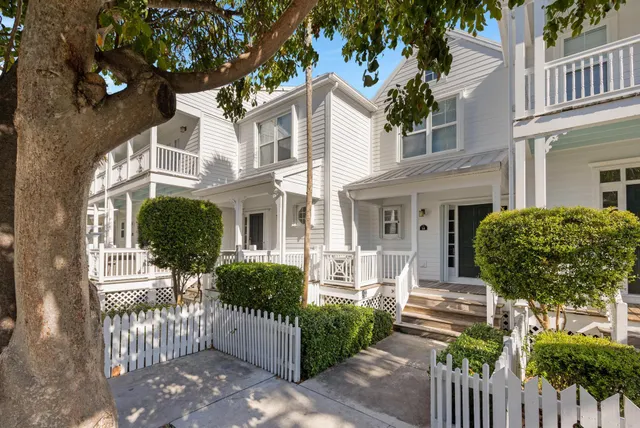 front view of a house with a small yard