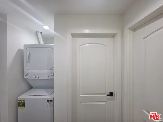a view of bathroom with a toilet and a sink