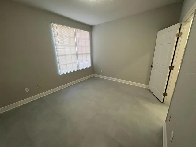 an empty room with a window