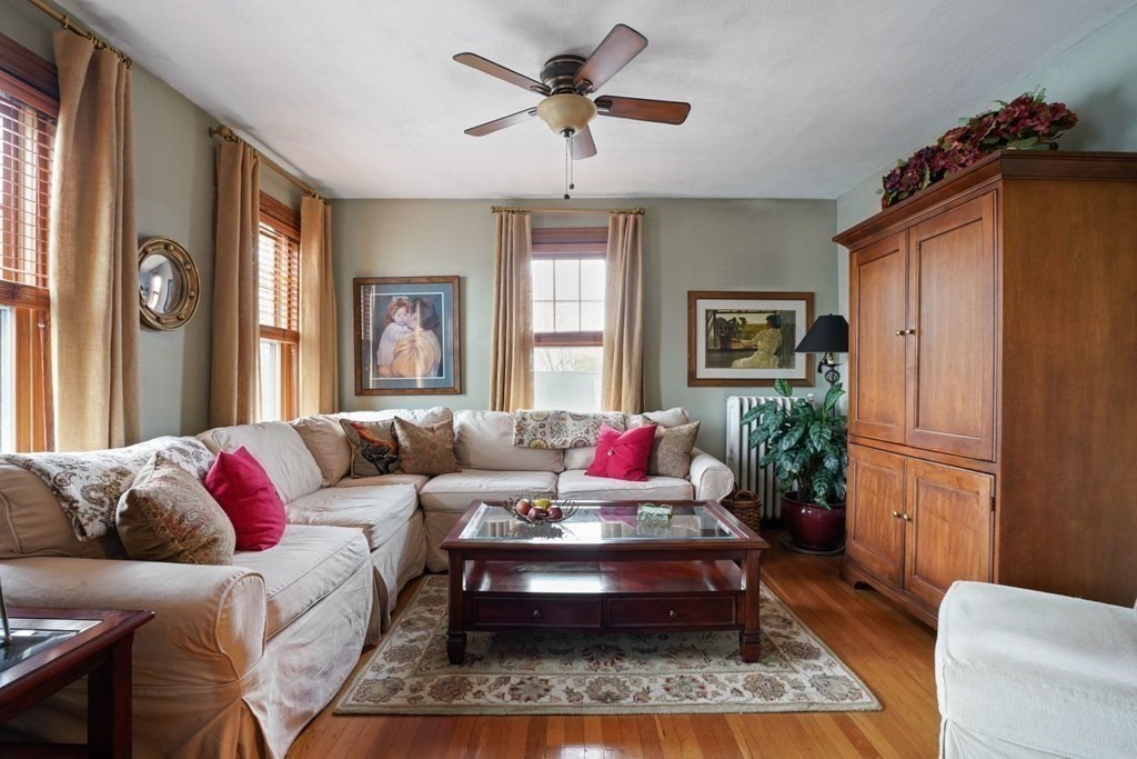 54 Olney Street Watertown, MA 02472 - Photo 15 of 28 a living room with furniture and a window