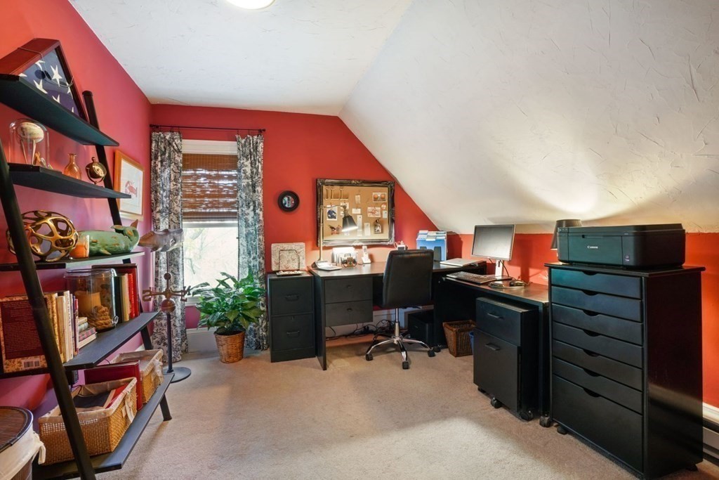 54 Olney Street Watertown, MA 02472 - Photo 20 of 28 a view of a workspace with furniture