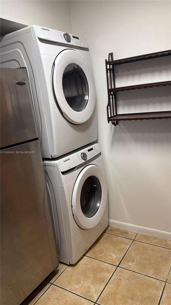 15312 Southwest 72nd Street, Unit 2112 Miami, FL 33193 - Photo 11 of 11 a utility room with dryer and washer