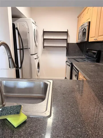 a bathroom with a toilet and a mirror