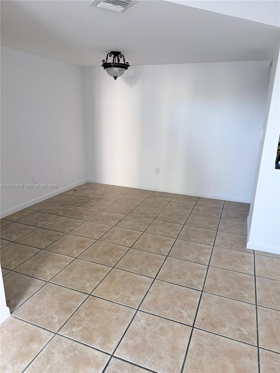 15312 Southwest 72nd Street, Unit 2112 Miami, FL 33193 - Photo 9 of 11 a view of an empty room