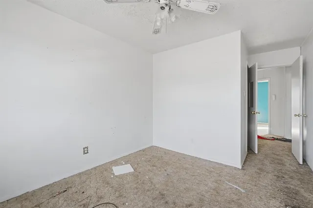 a view of a room with a hallway