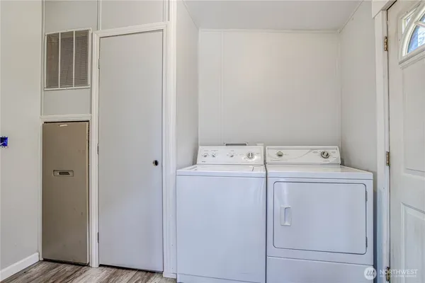 a utility room with dryer and washer
