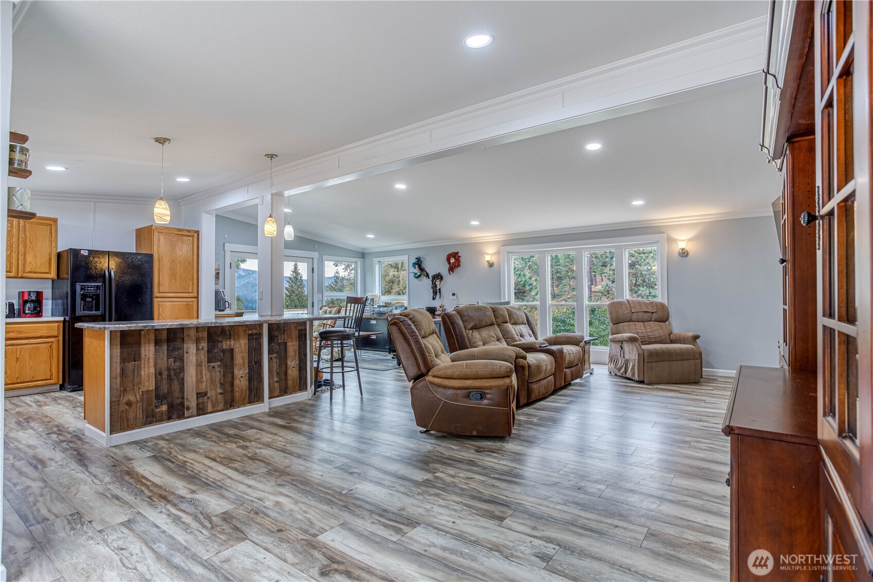 65 Sandstone Lane Cashmere, WA 98815 - Photo 15 of 39 a living room with furniture and a wooden floor
