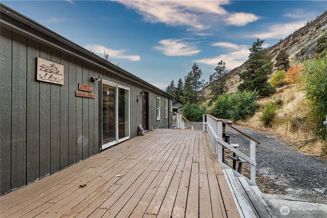 a view of a chairs on the roof deck