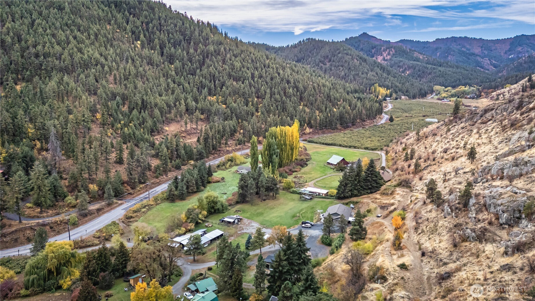 65 Sandstone Lane Cashmere, WA 98815 - Photo 38 of 39 a view of a lush green hillside and houses