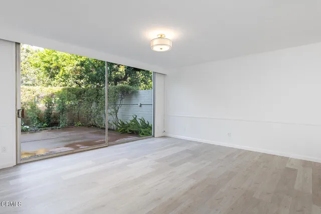 an empty room with a outdoor space