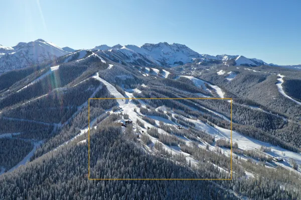 a view of a house with a mountain