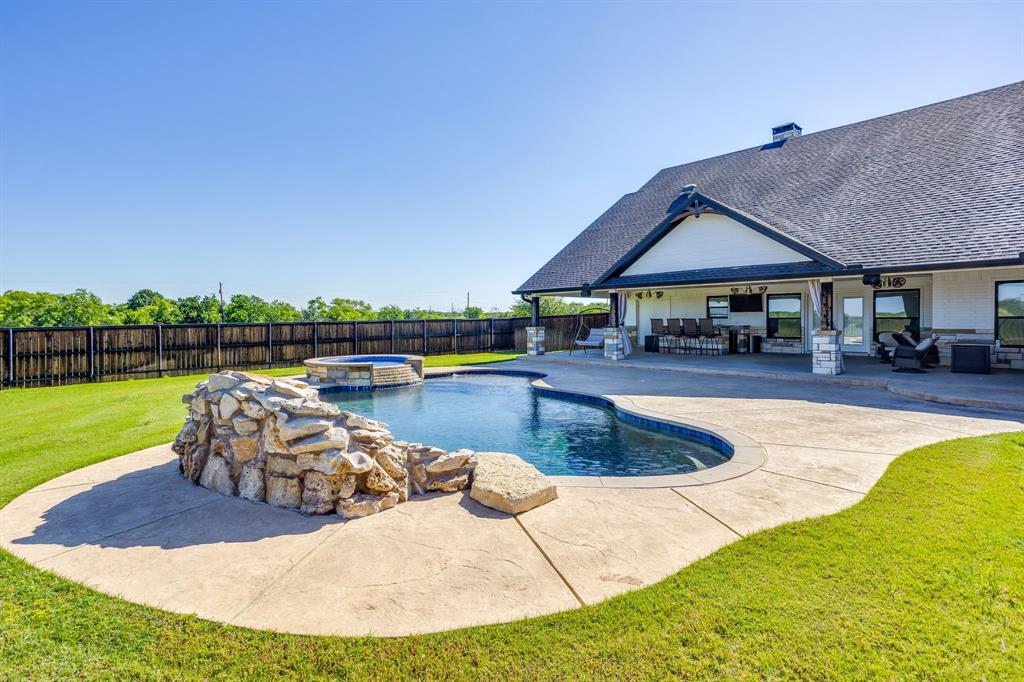 733 Fm 2652 Graham, TX 76450 - Photo 29 of 40 a view of a house with swimming pool and sitting area