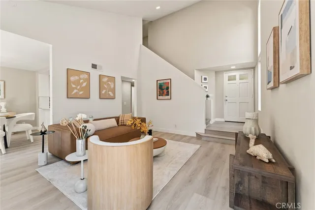 a living room with furniture and a couch