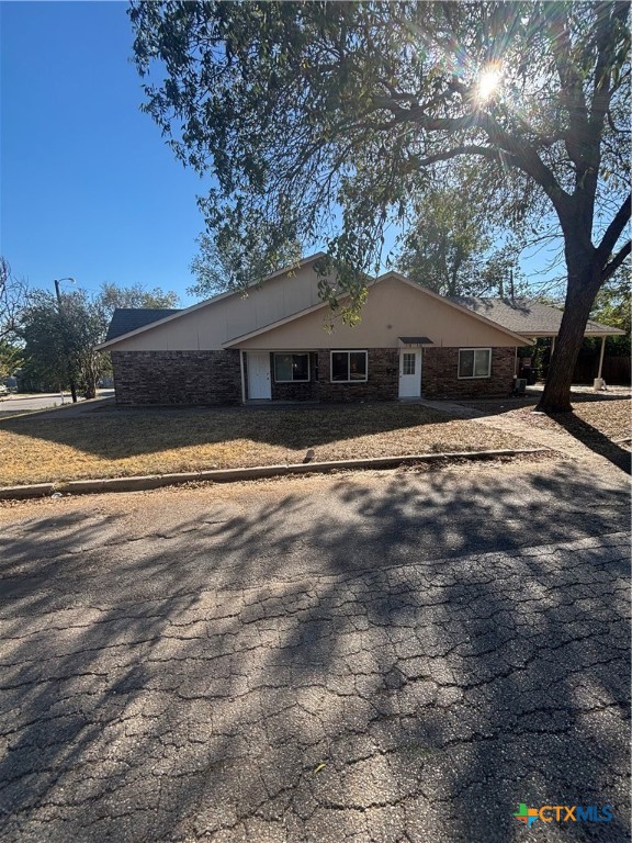 518 North 8th Street Temple, TX 76501 - Photo 1 of 24 a view of a house with a yard