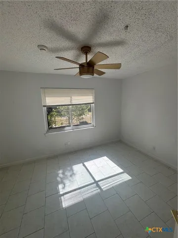 a view of empty room with window