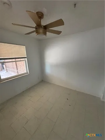 a bathroom with a shower and a shower