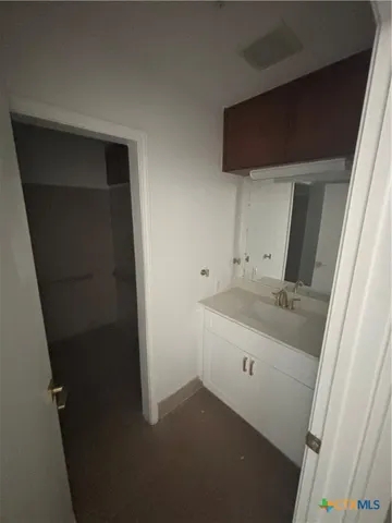 a view of a pool with a yard