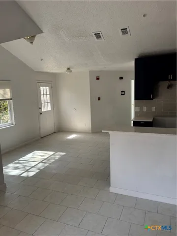 a view of kitchen and window