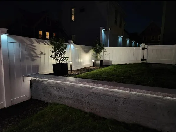 a view of a backyard of the house