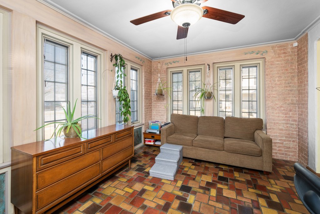 215 West Prospect Street Kewanee, IL 61443 - Photo 11 of 53 a living room with furniture and a large window