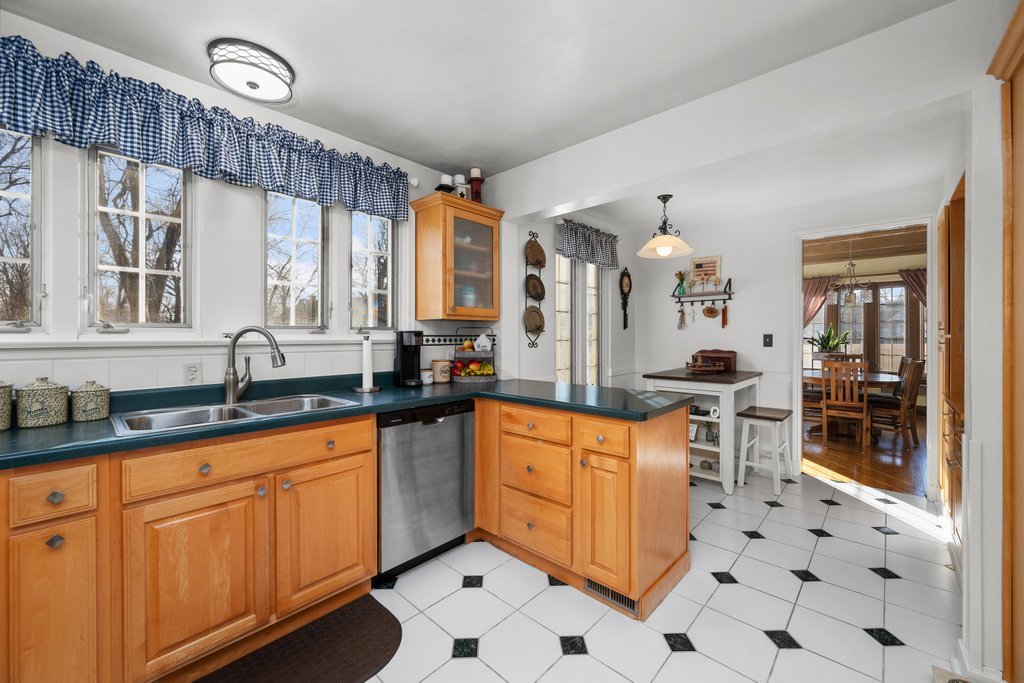 215 West Prospect Street Kewanee, IL 61443 - Photo 21 of 53 a kitchen with stainless steel appliances a sink stove and cabinets