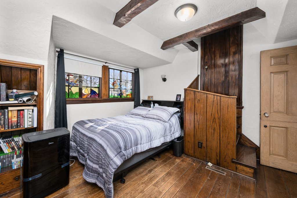 215 West Prospect Street Kewanee, IL 61443 - Photo 27 of 53 a bedroom with a bed closet and a flat tv screen