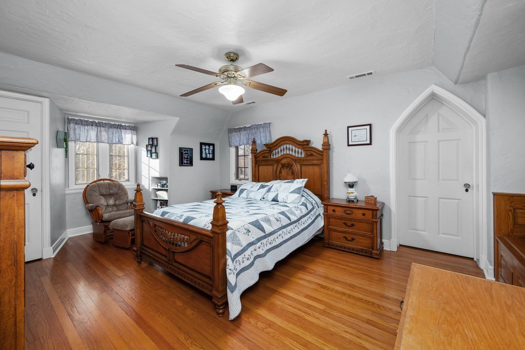 215 West Prospect Street Kewanee, IL 61443 - Photo 34 of 53 a bedroom with a bed and wooden floor