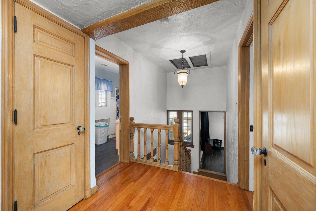 215 West Prospect Street Kewanee, IL 61443 - Photo 40 of 53 a view of a hallway with wooden floor and staircase