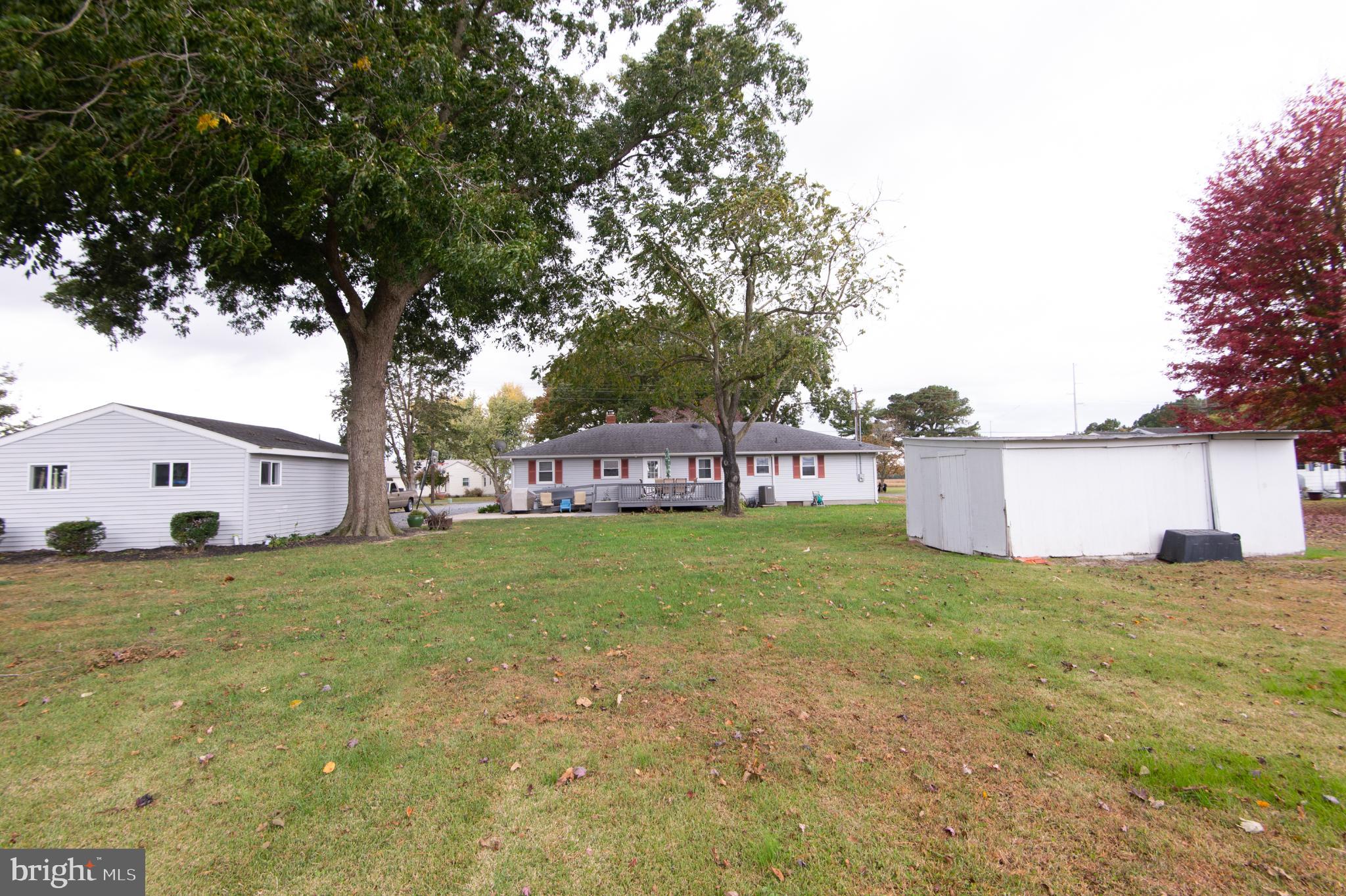 4909 Ravenwood Road Vienna, MD 21869 - Photo 24 of 27 Spacious yard with charming home backdrop.