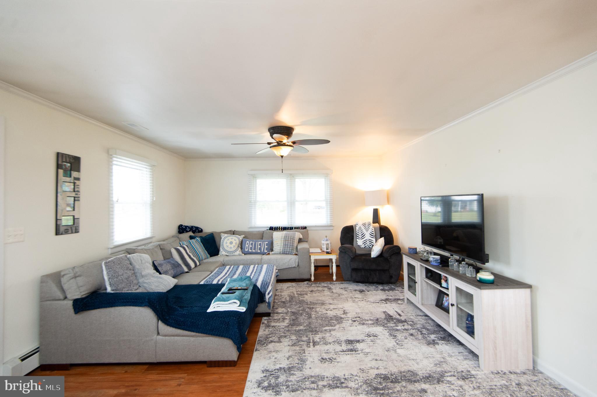 4909 Ravenwood Road Vienna, MD 21869 - Photo 5 of 27 Bright and inviting living space with charm.