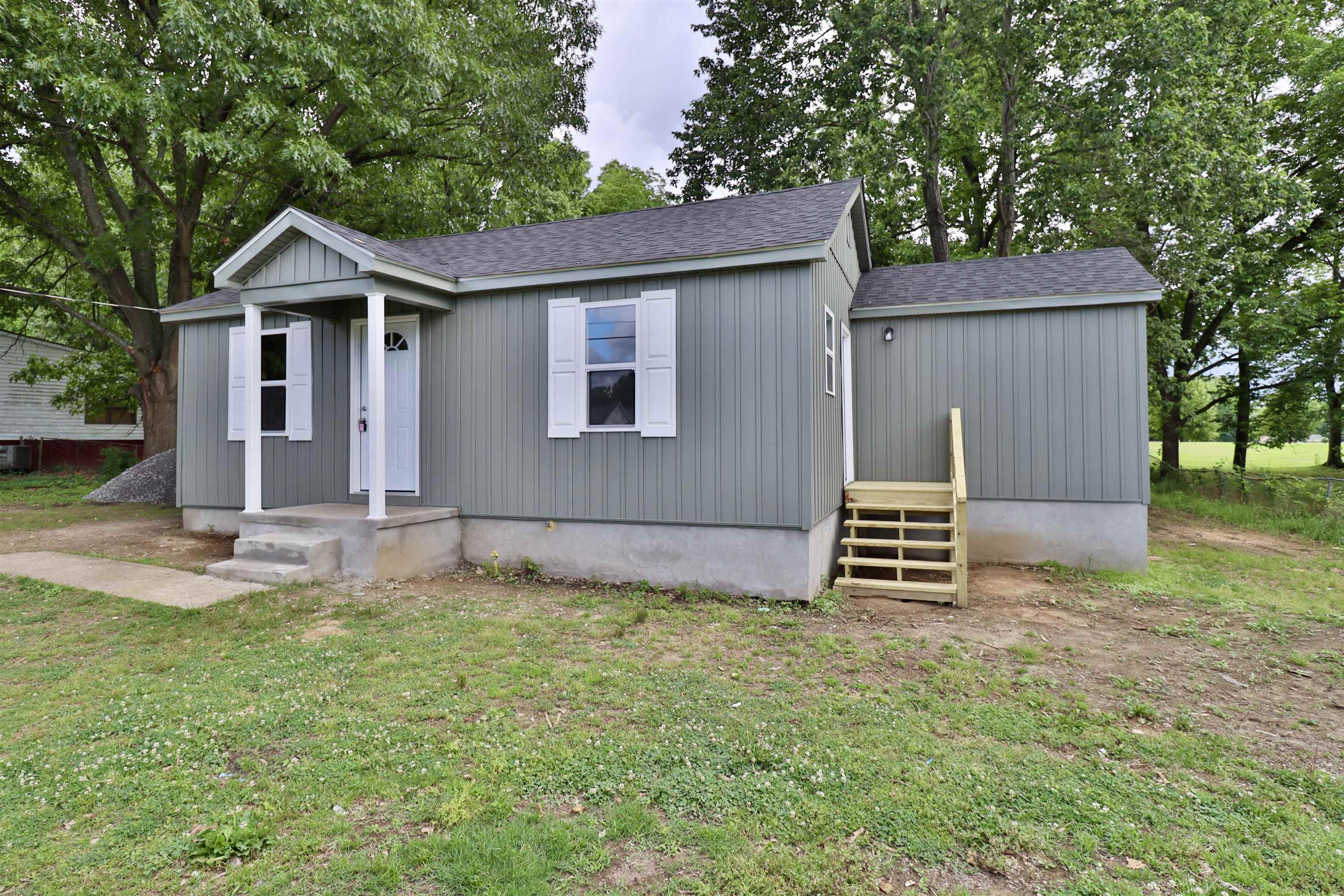 224 Kellar Avenue Ripley, TN 38063 - Photo 2 of 30 a front view of house with yard and trees