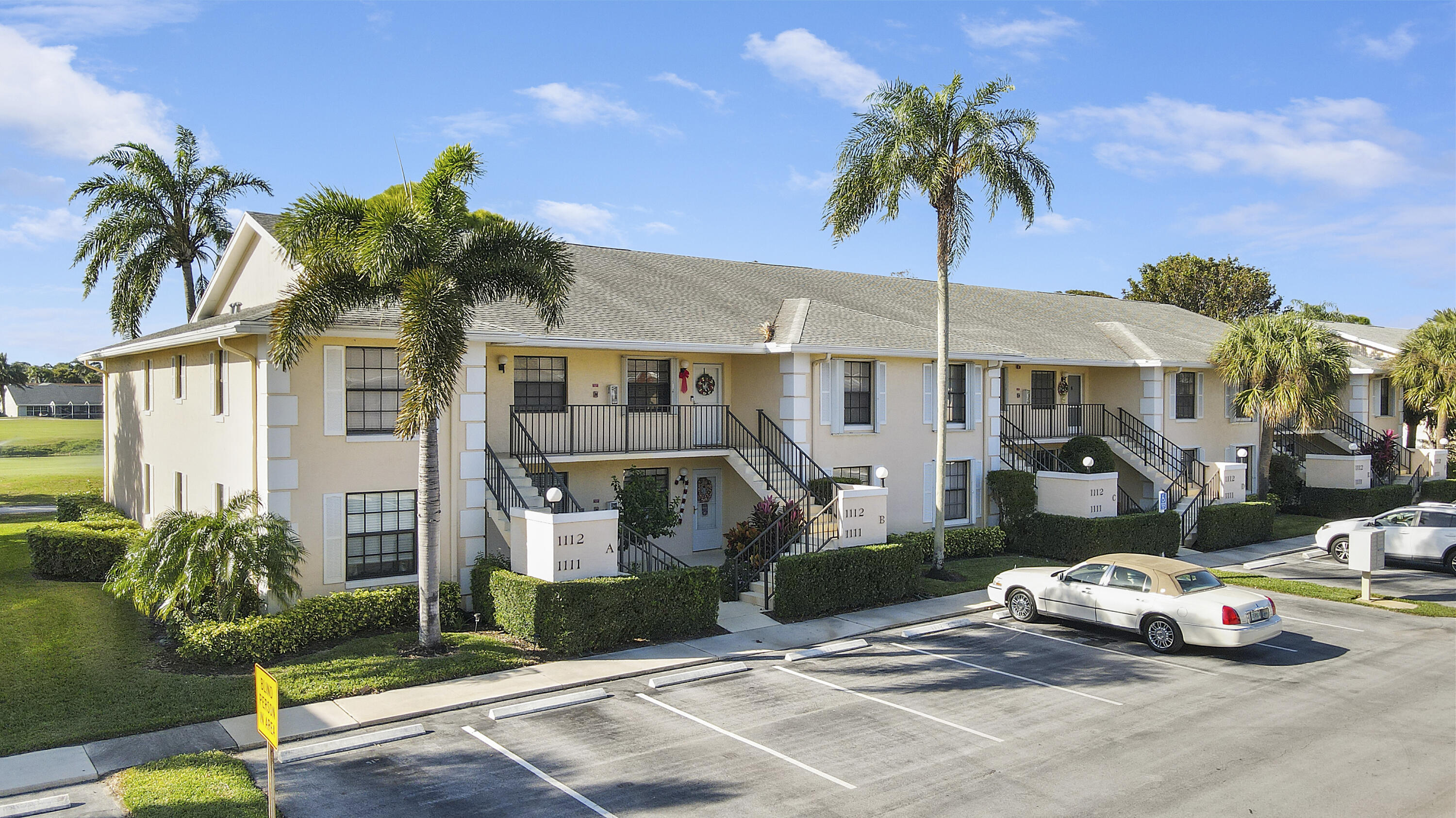 1112 Keystone Drive, Unit A Jupiter, FL 33458 - Photo 1 of 41 a front view of a house with garden