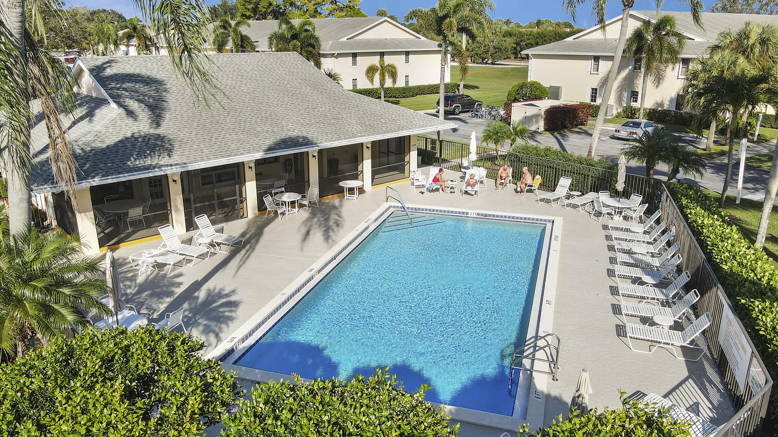 1112 Keystone Drive, Unit A Jupiter, FL 33458 - Photo 25 of 41 an aerial view of a house with a swimming pool