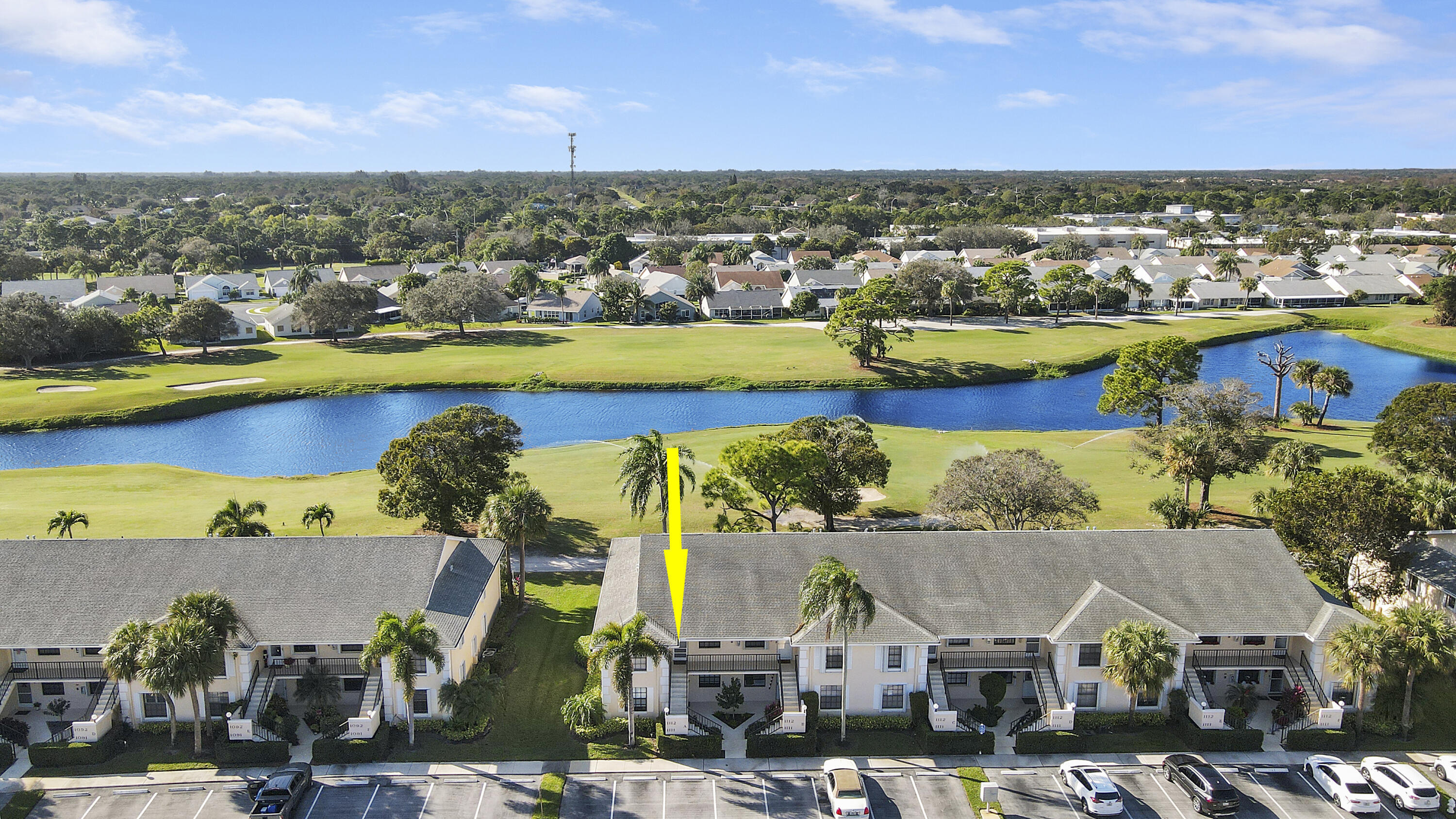 1112 Keystone Drive, Unit A Jupiter, FL 33458 - Photo 27 of 41 an aerial view of residential houses with outdoor space and swimming pool