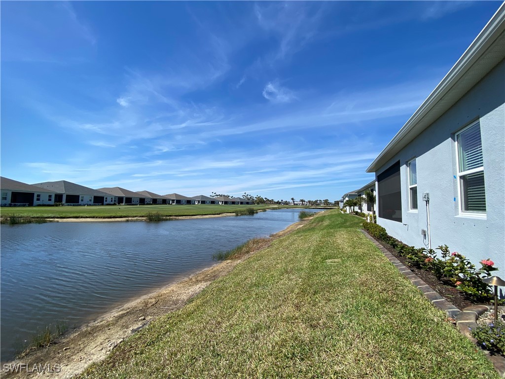 1927 Nottingham Trail Punta Gorda, FL 33980 - Photo 25 of 35 a view of a lake with a mountain