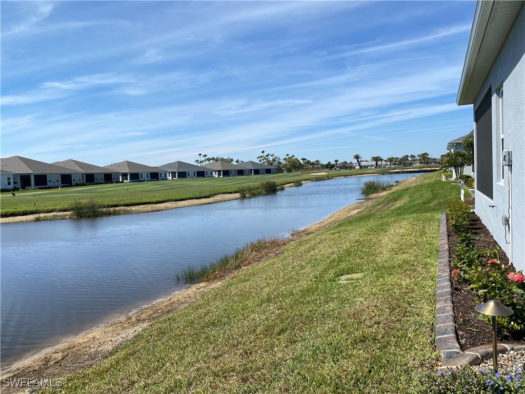 1927 Nottingham Trail Punta Gorda, FL 33980 - Photo 4 of 35 a view of lake with mountain in the background