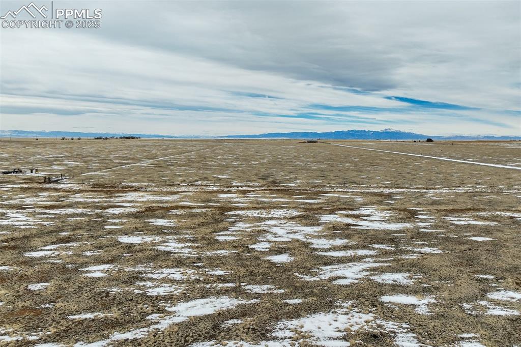 32290 North Neely Road Yoder, CO 80864 - Photo 24 of 26 View of water feature with a mountain view