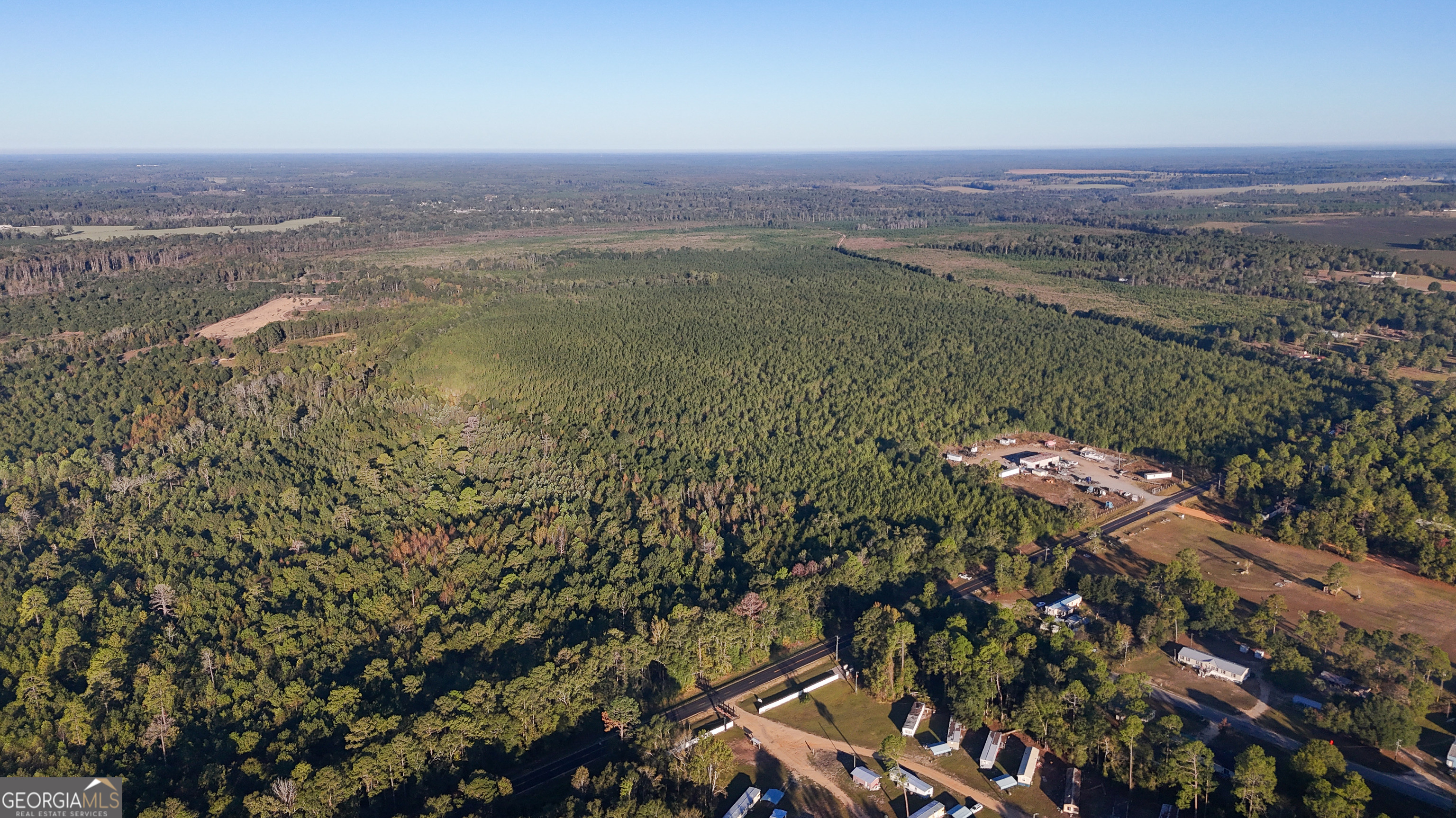 0 Buckeye Road East Dublin, GA 31027 - Photo 1 of 14 a view of a city with mountains in the background