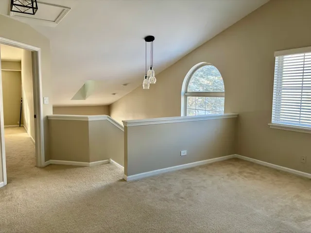 an empty room that has a window