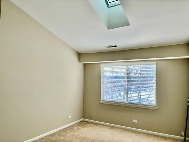 a view of a room that has a window