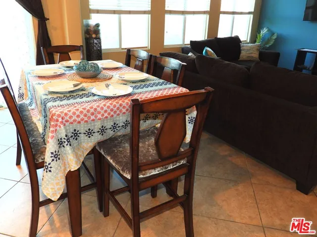 a bed sitting in a bedroom next to a fireplace