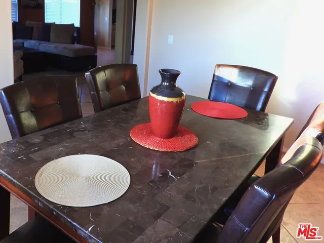 a view of a livingroom with furniture