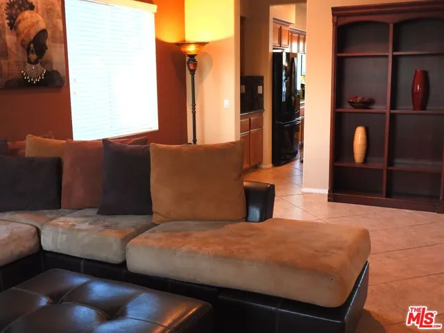 a bedroom with a bed and walk in closet